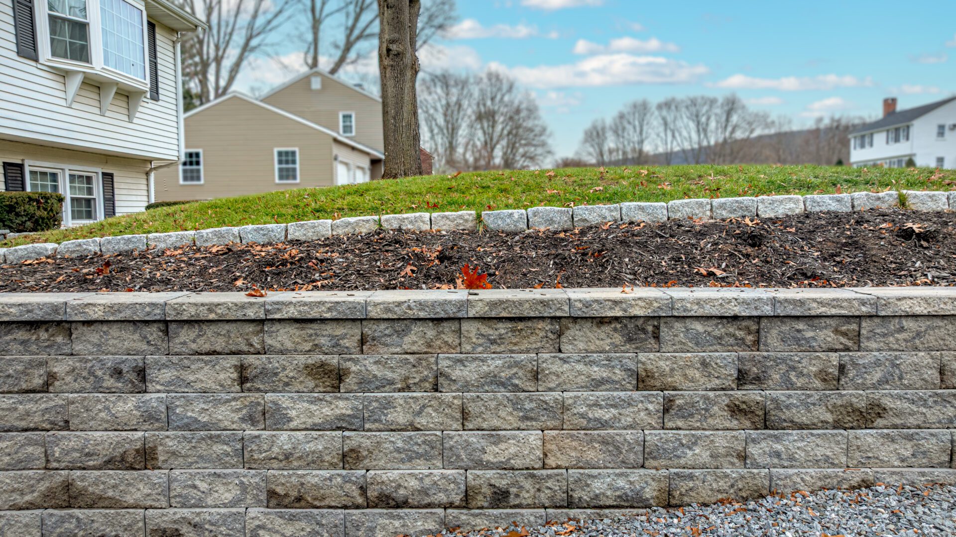 Professional retaining wall installation and landscaping in Cheshire, CT by HQ Landscaping